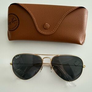 Ray-Ban Women’s Gold Aviator Sunglasses with Polarized Black Lenses